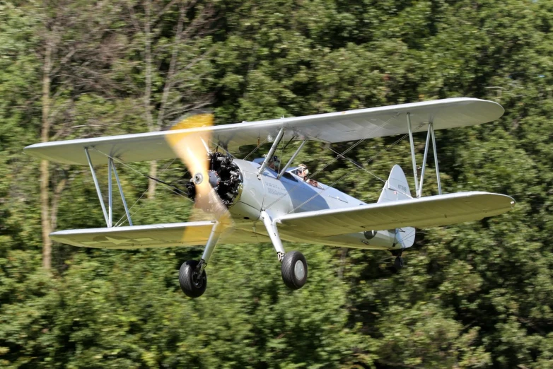 an airplane is flying low to the ground