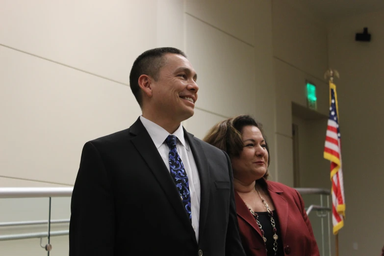 two business people standing next to each other