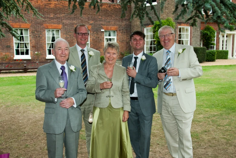 a group of men standing next to each other