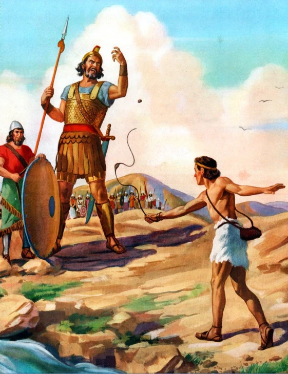 two men holding spears near some water