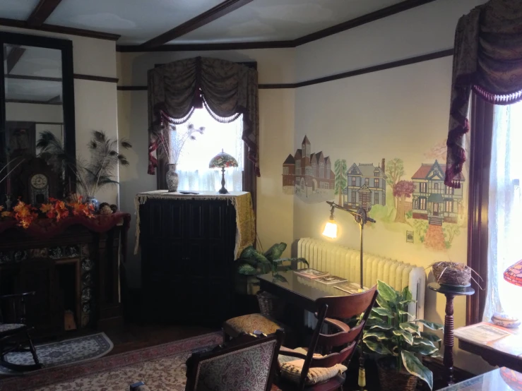 a very neat and nice living room with an arched window