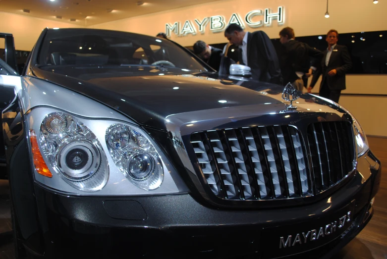 a limousine is on display in a showroom