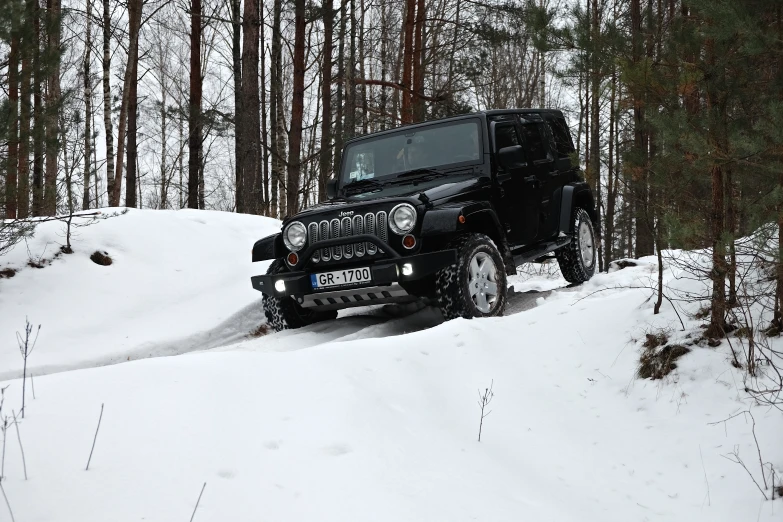 a vehicle driving on the snowy road