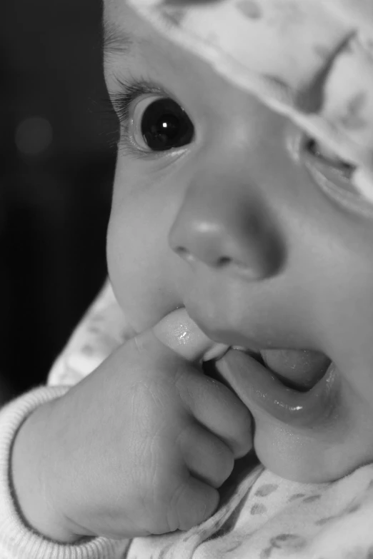 there is an image of a baby in black and white