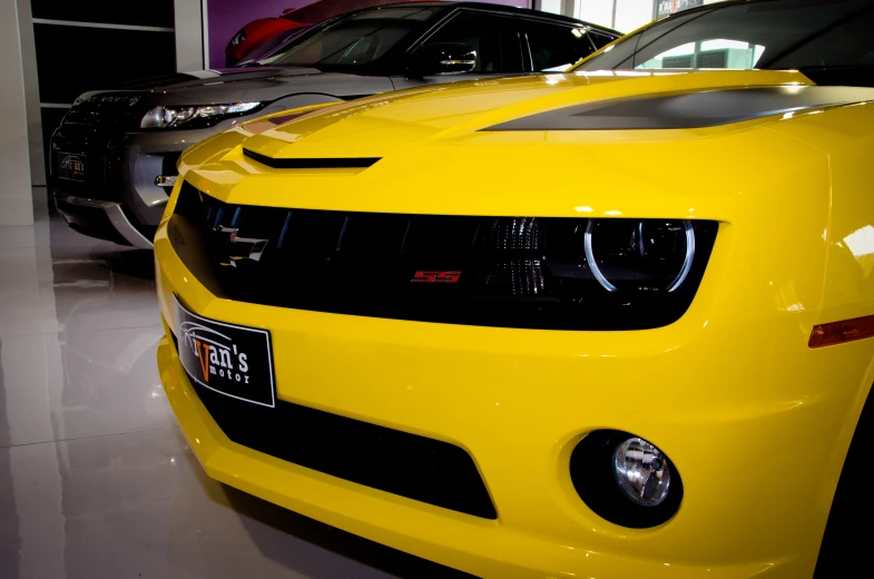 a large group of cars that are on display