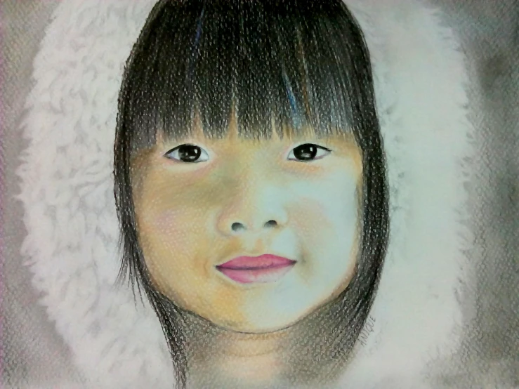 a close up view of a child's face on paper