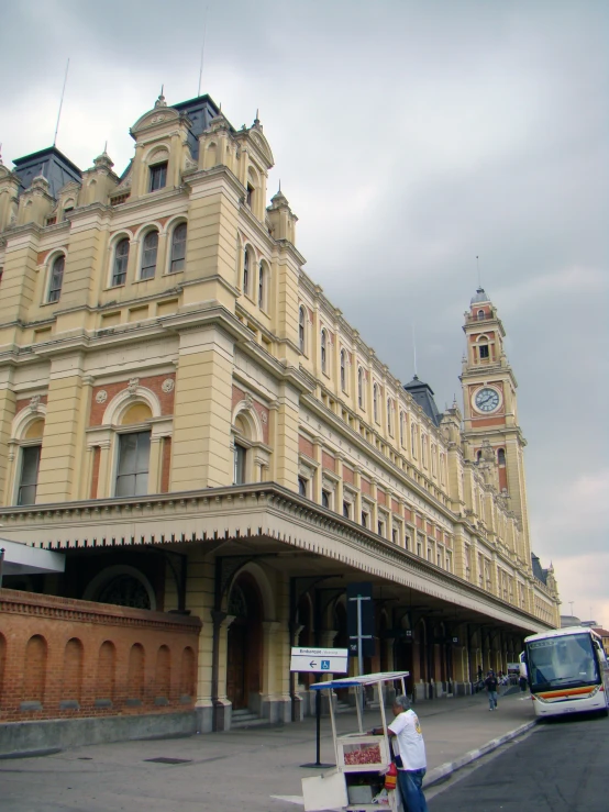 an older building sits in the middle of a street