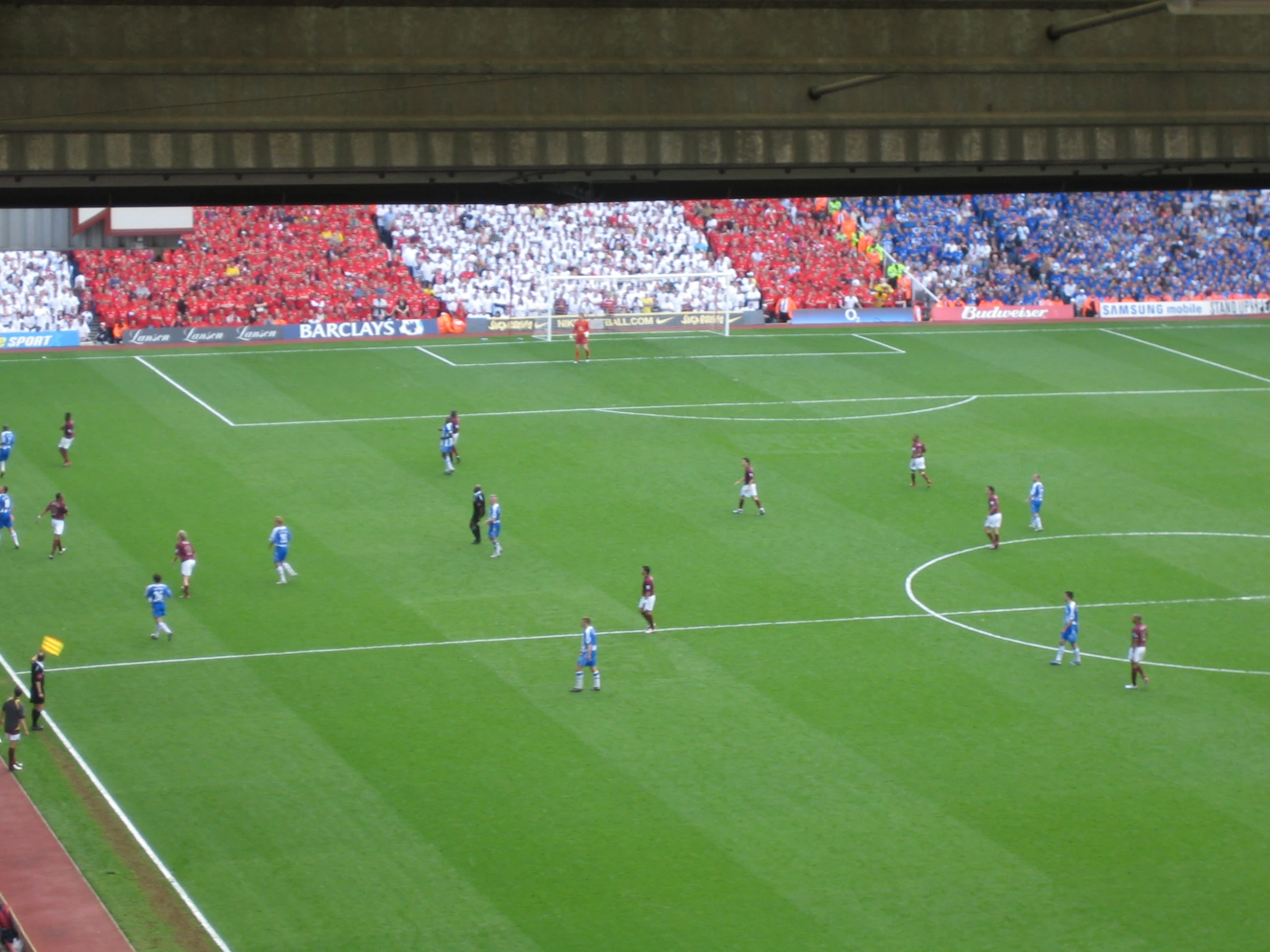 the team in blue and white are on a soccer field