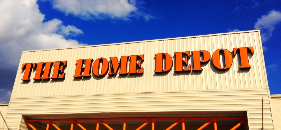 a white building with an orange lettering on it