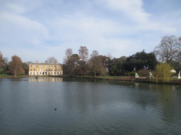 there is a large building near a lake