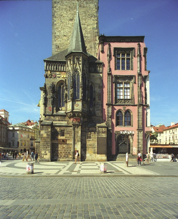 an old building is surrounded by stone streets