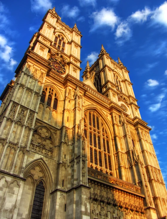 large tower with many windows is seen in the day light