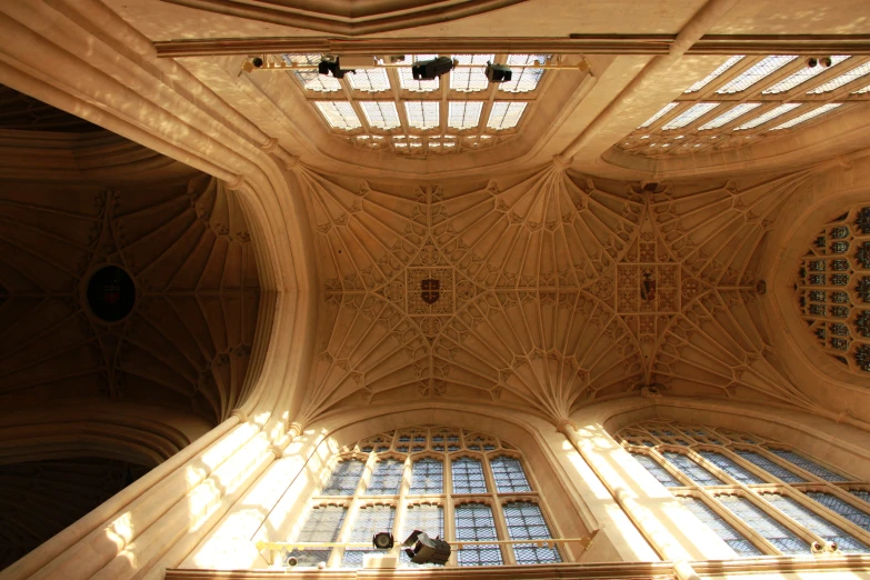 the ceiling and windows of an old building