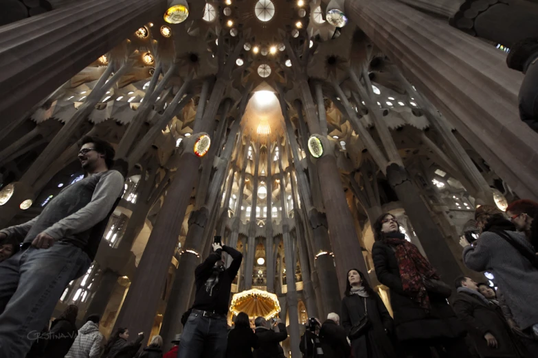 the view inside a building with people taking pos