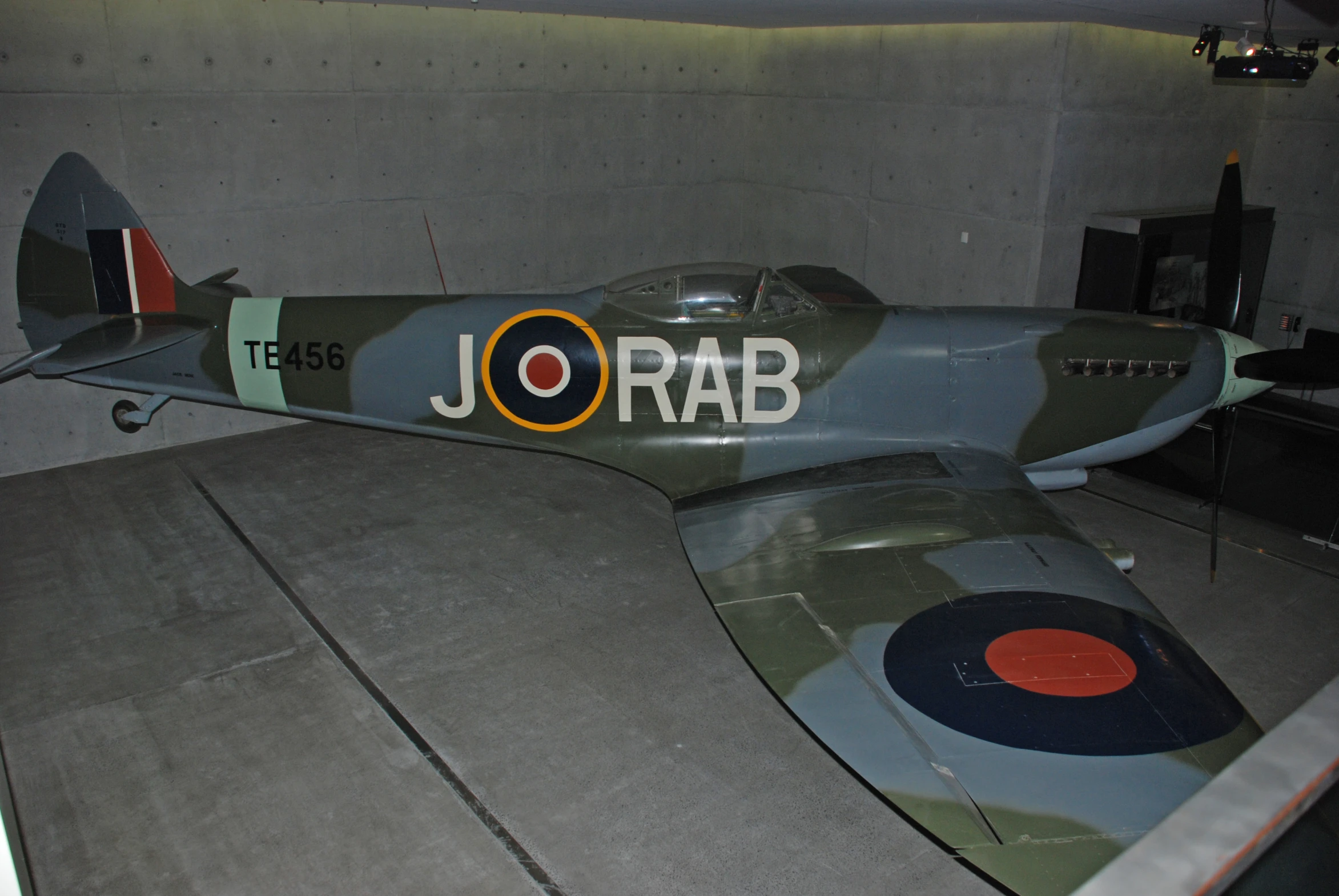 an old airplane is displayed on display inside