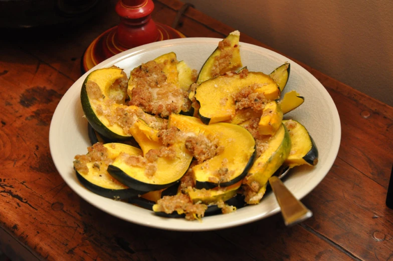 a plate of stuffed squash sitting on a table