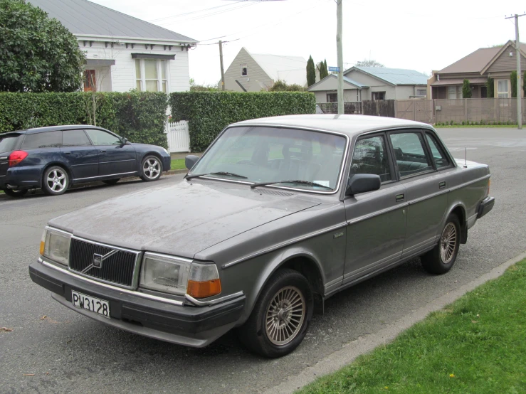 a car is parked on the street outside