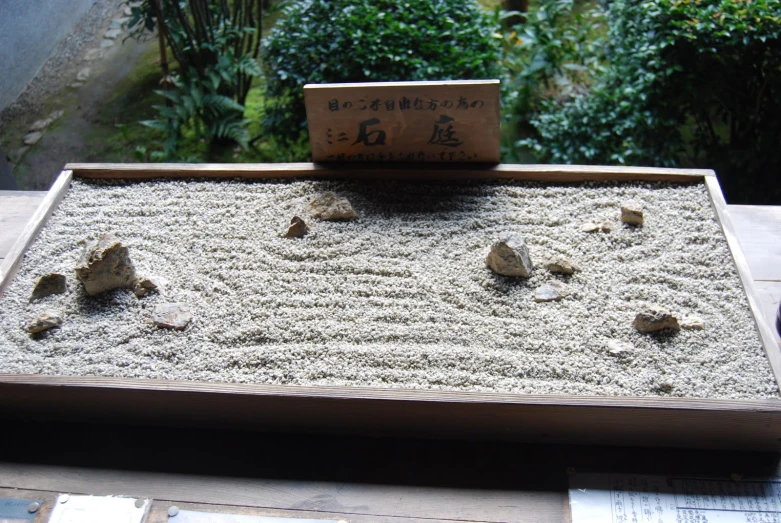 a large sand tray on top of a wooden table