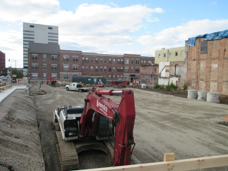 a construction site with an excavator at it