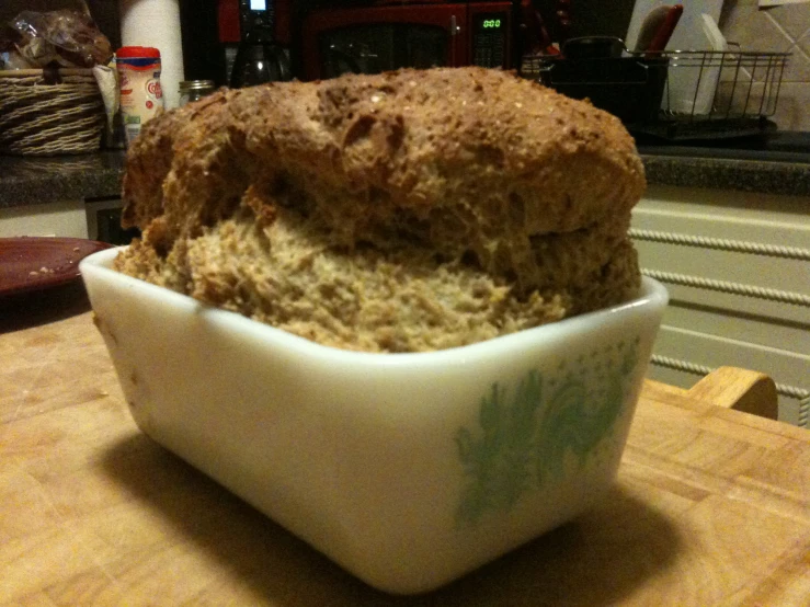 a bowl of bread is sitting on a table