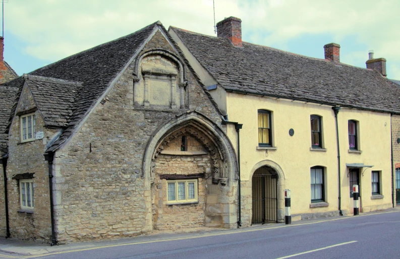 this building has been bricked and stoned but the front has a window