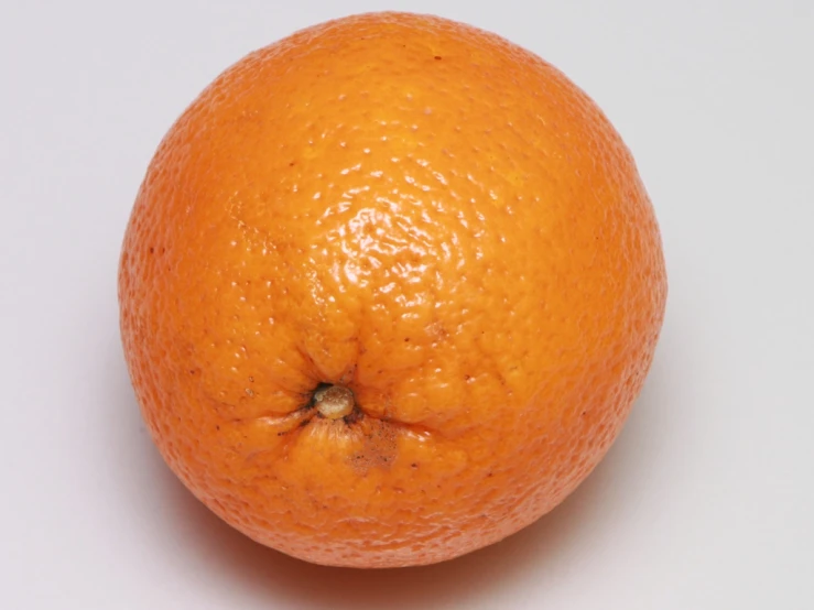 an orange has only been cut in half
