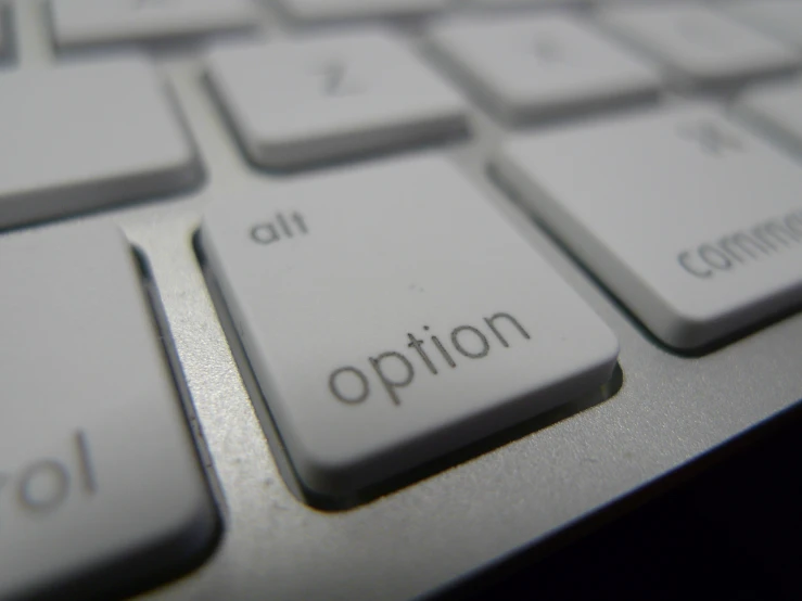 a keyboard with an option on it is shown