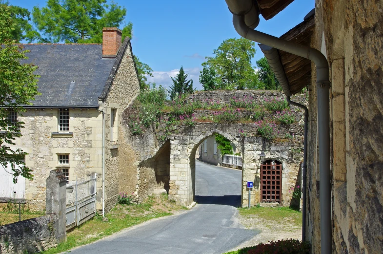 the old fashioned building has arched windows on it's sides