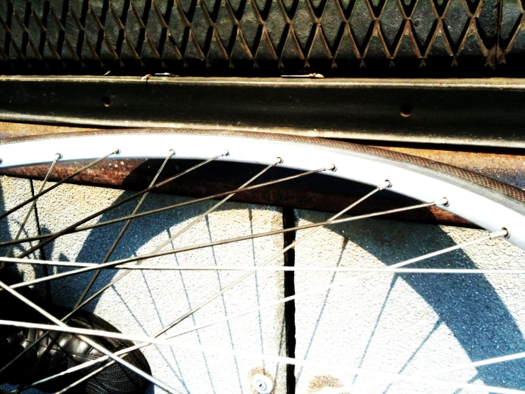 an image of close up of spokes on bicycle wheels