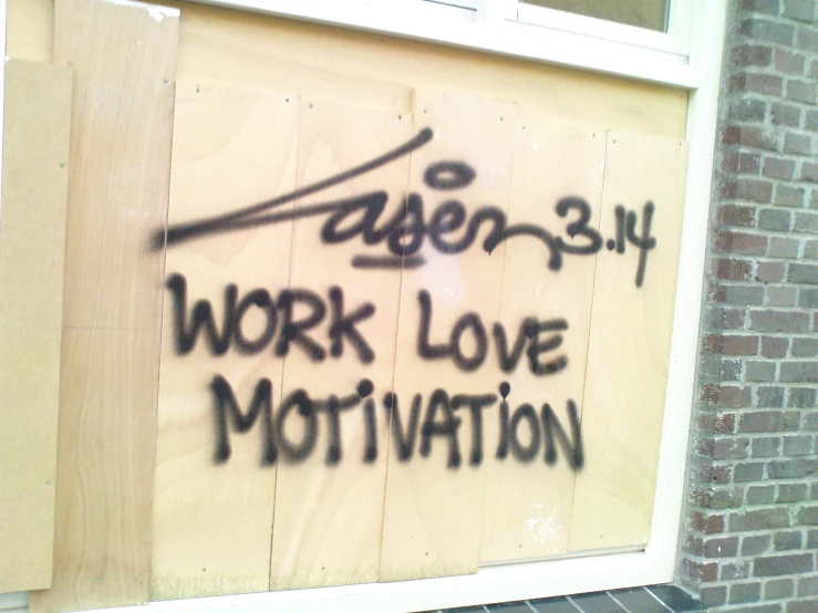 a work love motivation sign on a window