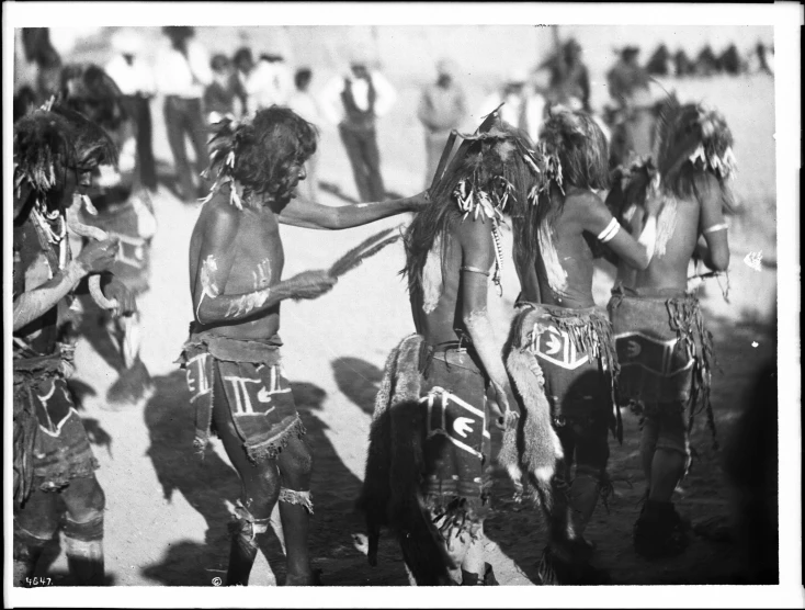 dancers in costumes from the zilian pacific dance company dancing on the beach