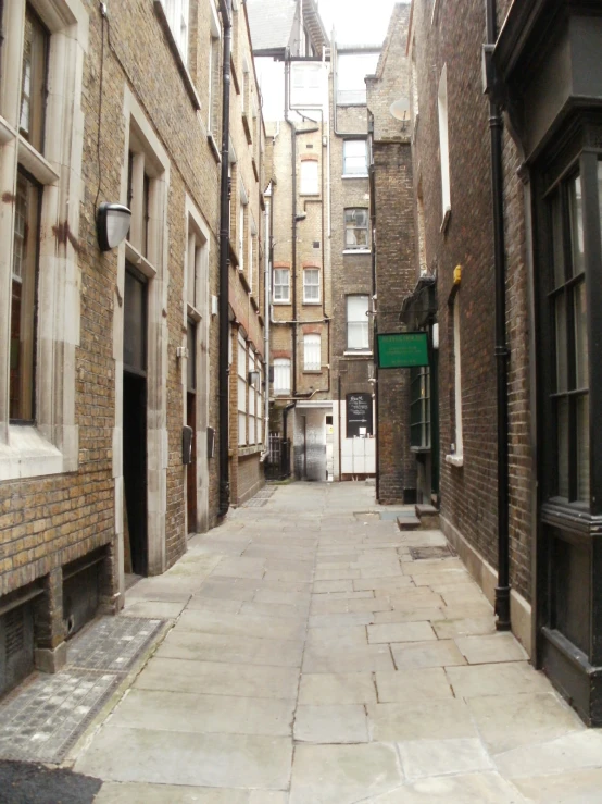 an empty street is shown in this old city