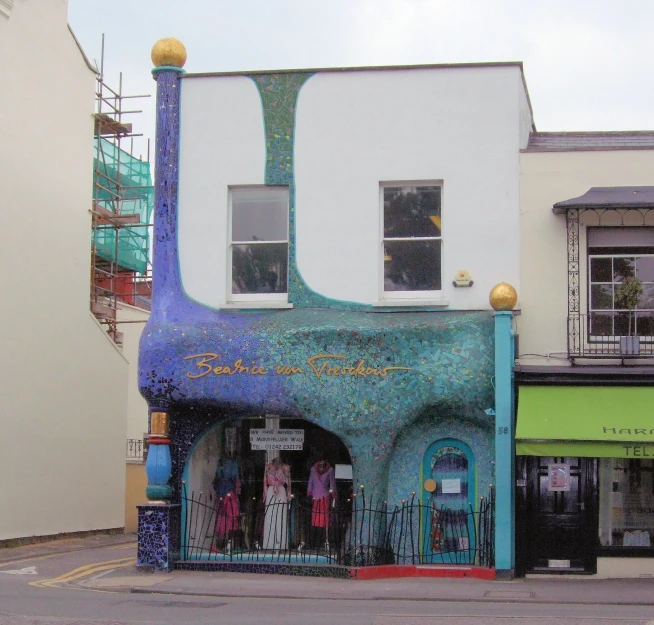 a multi - colored building that has different colored exterior