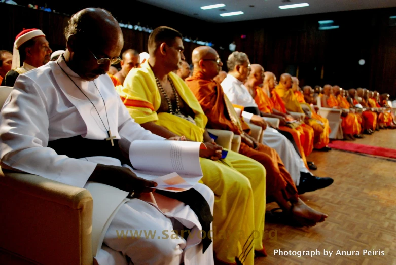 the people are sitting down for the event