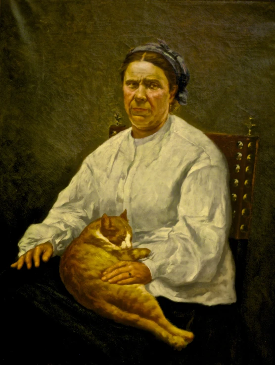 this woman has a cat in her lap