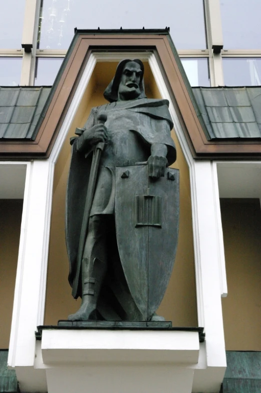 a statue of a man dressed in armor