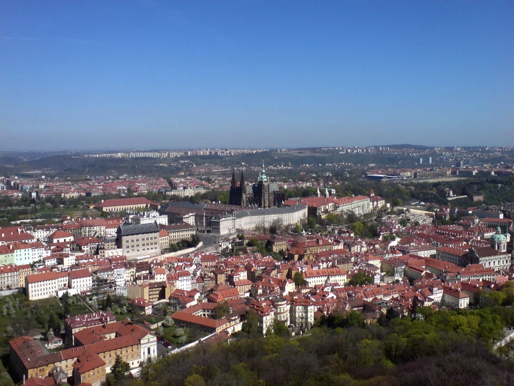 the city is surrounded by trees and lots of buildings