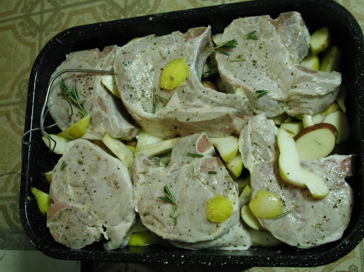 a pan filled with different types of food