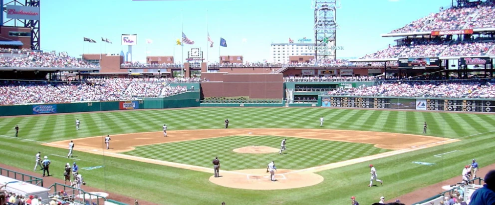 a baseball stadium full of people on some playing field