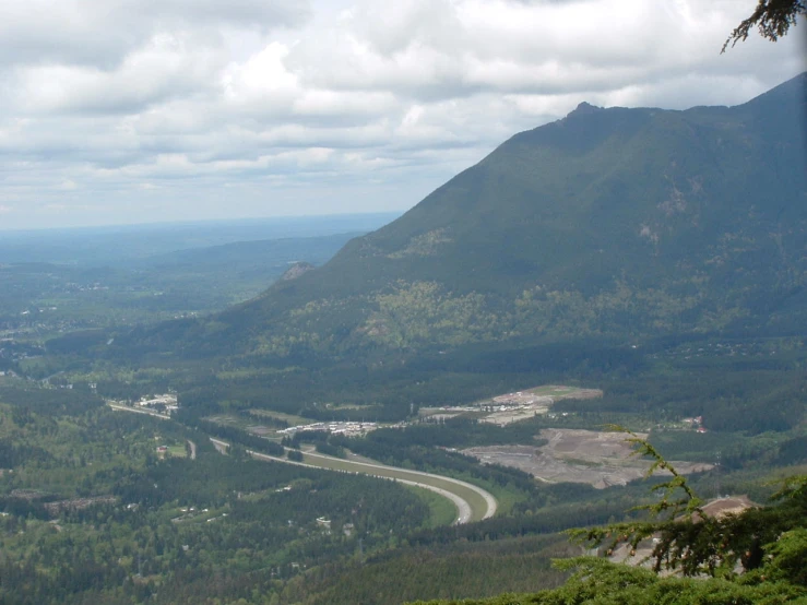 a picture from the top of a hill with roads