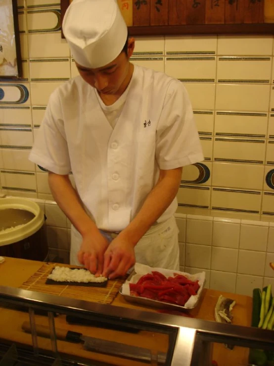 a chef prepares to chop food in the kitchen