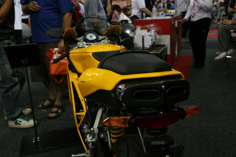 a parked motorcycle sitting on top of a table