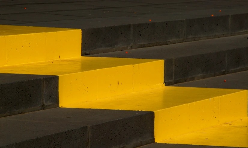 steps are set to the yellow, dark stairs