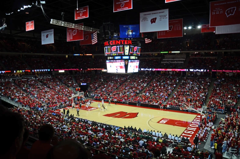 a basketball court in a stadium filled with people