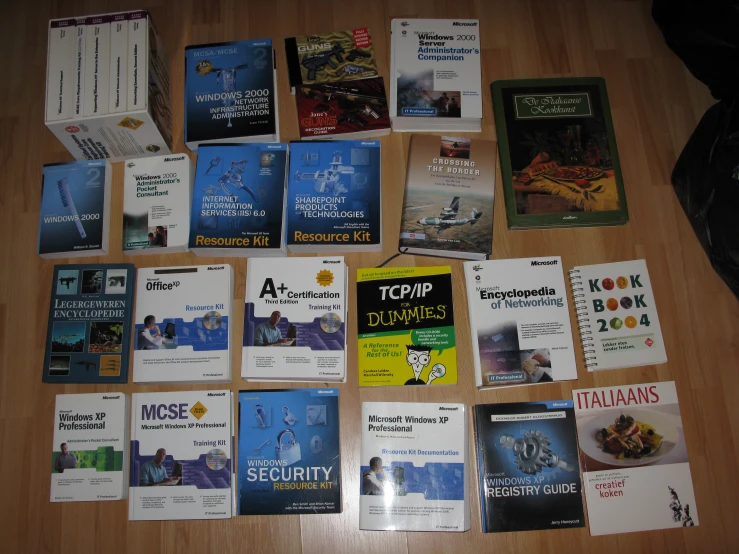several pamphlets sit on the ground in front of the table