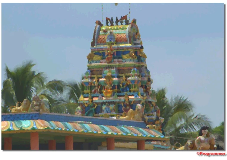 a carousel tower covered in figures and other decor