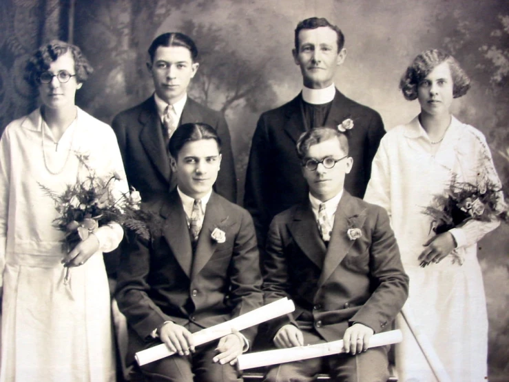 an old black and white po of a family in a formal dress