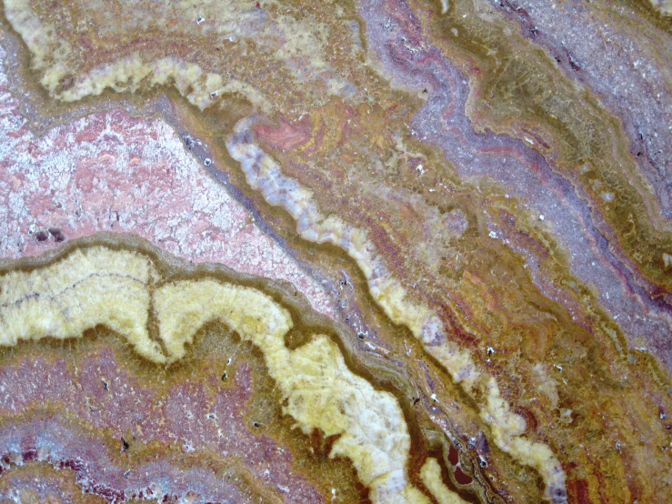 a pograph of a granite slab with lots of brown paint