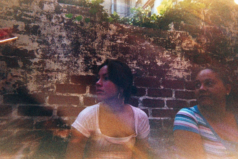 a woman with hair up with a frisbee on a table