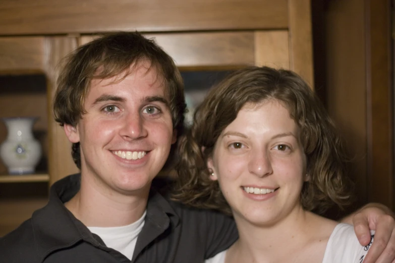 a man and a woman posing for a picture